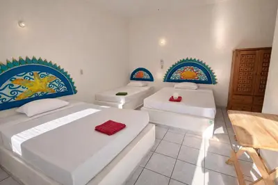 Cama o camas de una habitación en Kaia Beach Hotel