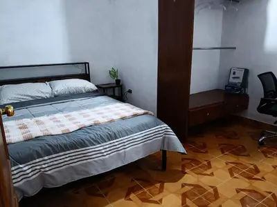 Cama o camas de una habitación en Cerca de pirámides, bancos, centros, UDLA, paradas