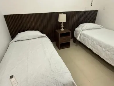 Cama o camas de una habitación en Suite La Lomita #4 Climatizada