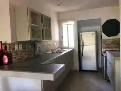 Una cocina o zona de cocina en Condominio La Parota