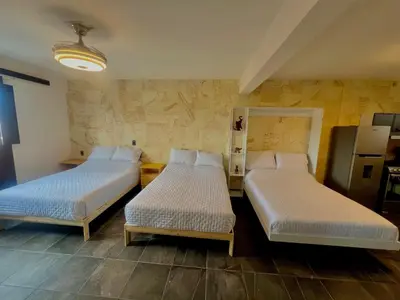 Cama o camas de una habitación en LA ESTANCIA, Casa EA Oaxaca, Centro Histórico, Balcón a las Montañas