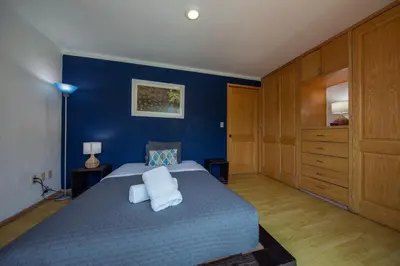 Cama o camas de una habitación en Casa Hidalgo By Mi Querido Coyoacán