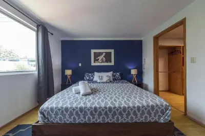 Cama o camas de una habitación en Casa Hidalgo By Mi Querido Coyoacán