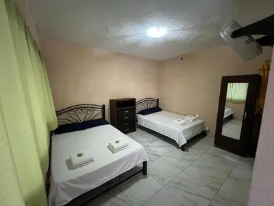 Cama o camas de una habitación en Casa en Cuautla, Morelos