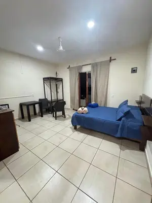 Cama o camas de una habitación en Karibu Rinconada