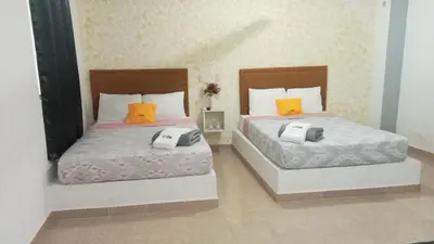 Cama o camas de una habitación en Naemy Villas Suite