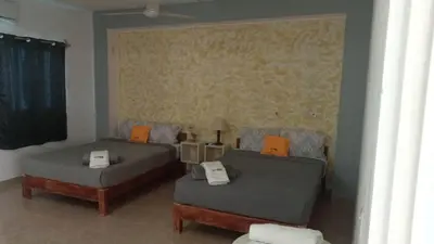 Cama o camas de una habitación en Naemy Villas Suite
