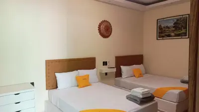 Cama o camas de una habitación en Naemy Villas Suite