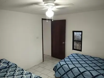 Cama o camas de una habitación en Cómodas Casas en el centro de Coatepec Veracruz