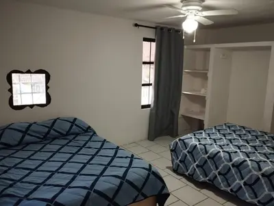 Cama o camas de una habitación en Cómodas Casas en el centro de Coatepec Veracruz