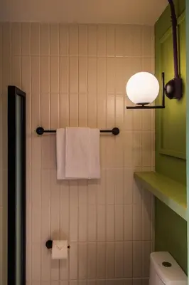 Un baño de Nico Hotel & Residences