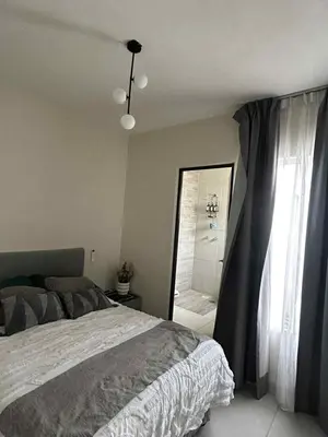 Cama o camas de una habitación en Bonita casa amueblada, cerca de una iglesia, playas y centros comerciales