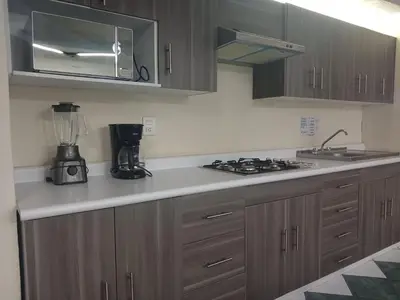 Una cocina o zona de cocina en Departamentos Arista