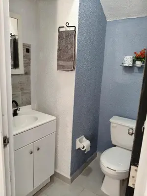 Un baño de Hermosa casa de 3 recámaras y 4 camas wifi y frente a balneario