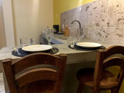 Una cocina o zona de cocina en 1-Bed Loft in Oaxaca - Steps from Downtown