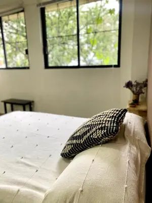 Cama o camas de una habitación en 2-Beds Loft in Oaxaca - Steps from Downtown