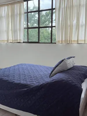 Cama o camas de una habitación en Casa en el Centro 7BR para 16 personas