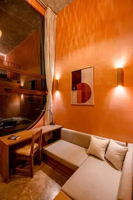 Zona de estar de Amplitude Coliving