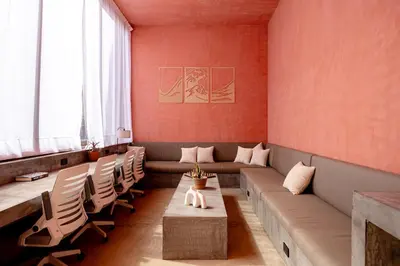 Zona de estar de Amplitude Coliving