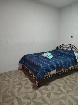 Cama o camas de una habitación en La casa se los abuelos