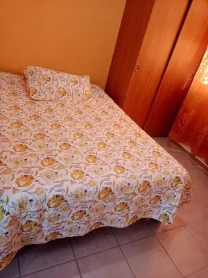 Cama o camas de una habitación en Casa en fraccionamiento en Ahuatepec con alberca, cancha y cerca de Tepoztlán