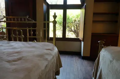 Cama o camas de una habitación en Dream Garden Villa in the Heart of Oaxaca