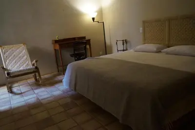 Cama o camas de una habitación en Dream Garden Villa in the Heart of Oaxaca