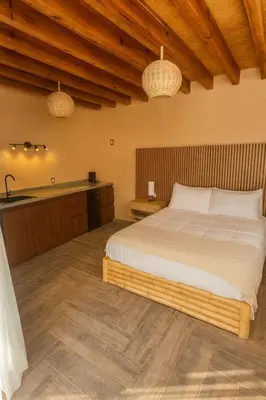 Cama o camas de una habitación en Bambu Villas Wellness Center