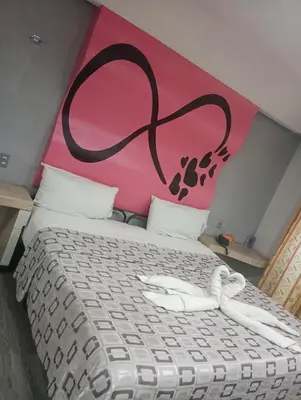 Cama o camas de una habitación en Hotel Florencia