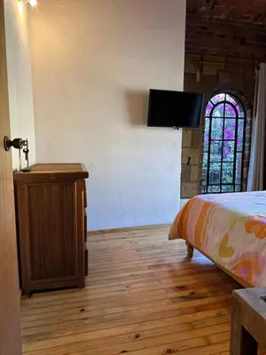 Cama o camas de una habitación en Casa Rústica del pedregal