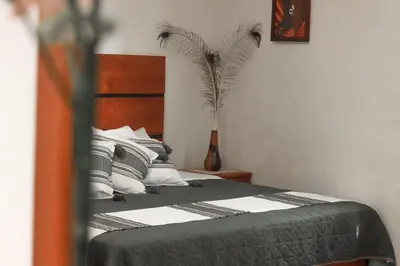 Cama o camas de una habitación en Hotel Boutique Canto Del Agua