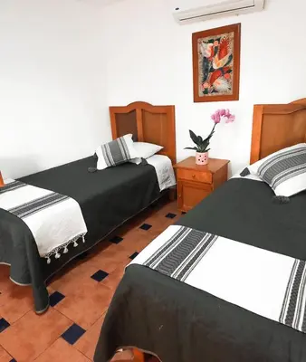 Cama o camas de una habitación en Hotel Boutique Canto Del Agua
