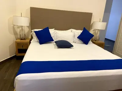 Cama o camas de una habitación en Palmarena Residences 2 Bedroom Ocean Front Condo 180 degree ocean views