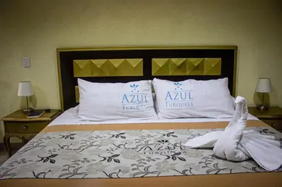 Cama o camas de una habitación en Departamento con servicio de hotel