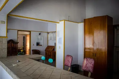 Zona de estar de Departamento con servicio de hotel