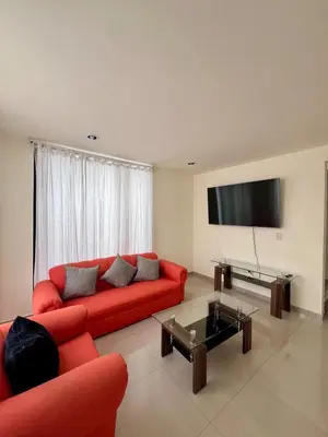 Una televisión o centro de entretenimiento en Hermosa residencia en San Pedro Cholula