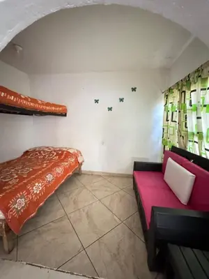 Cama o camas de una habitación en Dianas Home Oaxtepec
