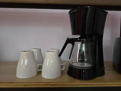 Utensilios para hacer té y café en Suite Roja moderna para hasta 3 huéspedes Céntrica, cómoda y con excelente conectividad