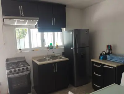 Una cocina o zona de cocina en Bonita casa equipada, cerca de jardines de México