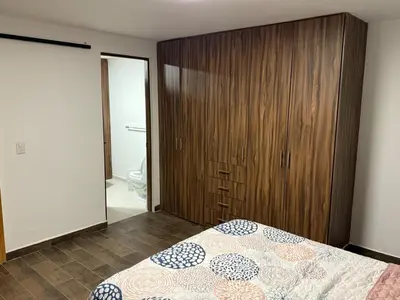 Cama o camas de una habitación en Casa Cholula