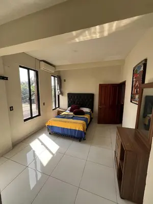 Cama o camas de una habitación en Departamento en Cuernavaca