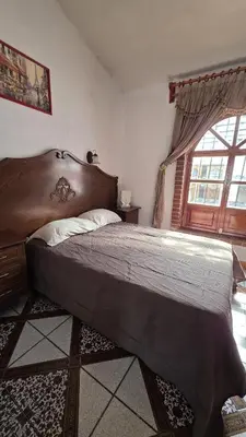 Cama o camas de una habitación en Casa Quijote