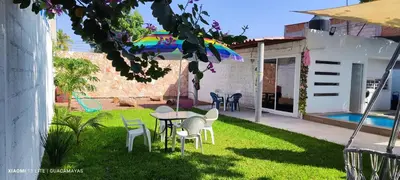 Jardín al aire libre en Casa Guacamayas