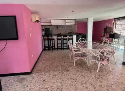 Una televisión o centro de entretenimiento en Villa La Rosa Acapulco