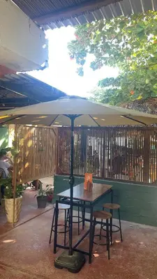 Un patio o zona al aire libre en Olivo Hostel, Punta Zicatela