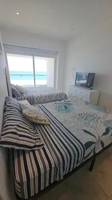 Cama o camas de una habitación en Vista de ensueño en Playa Diamante