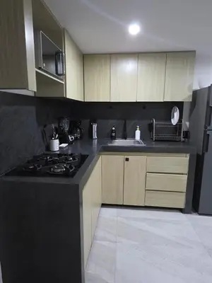 Una cocina o zona de cocina en Departamento frente a bahía con hermosa vista