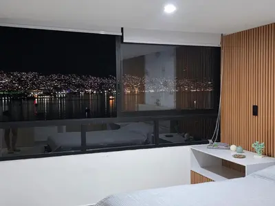 Cama o camas de una habitación en Departamento frente a bahía con hermosa vista