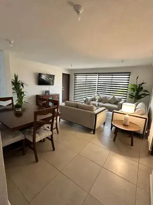 Una televisión o centro de entretenimiento en Departamento en zona Diamante a 3 minutos del mar