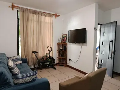 Una televisión o centro de entretenimiento en Casa Tradición Oaxaqueña